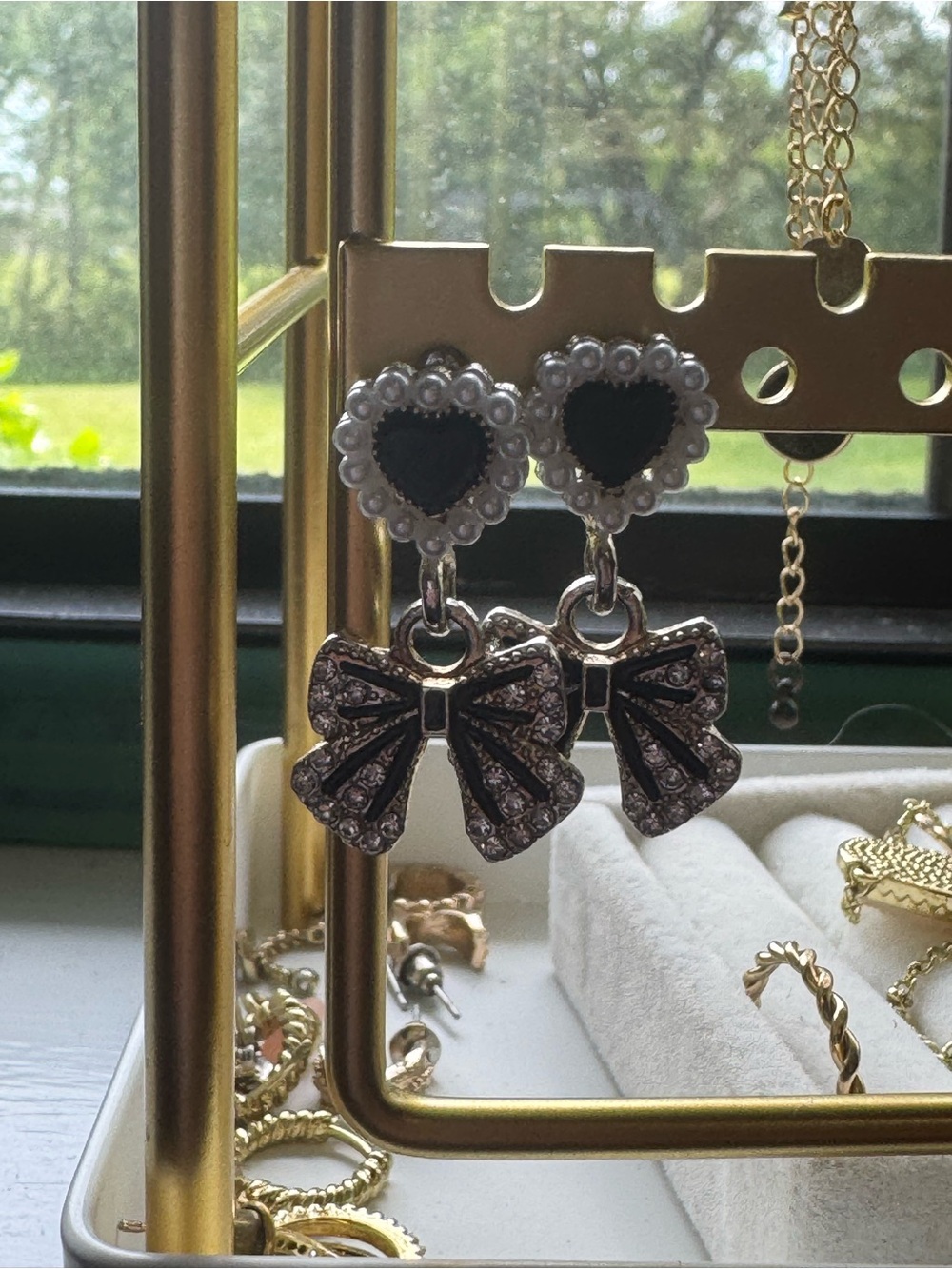 Elegant Heart & Bow Drop Earrings - Black Pearls Accent